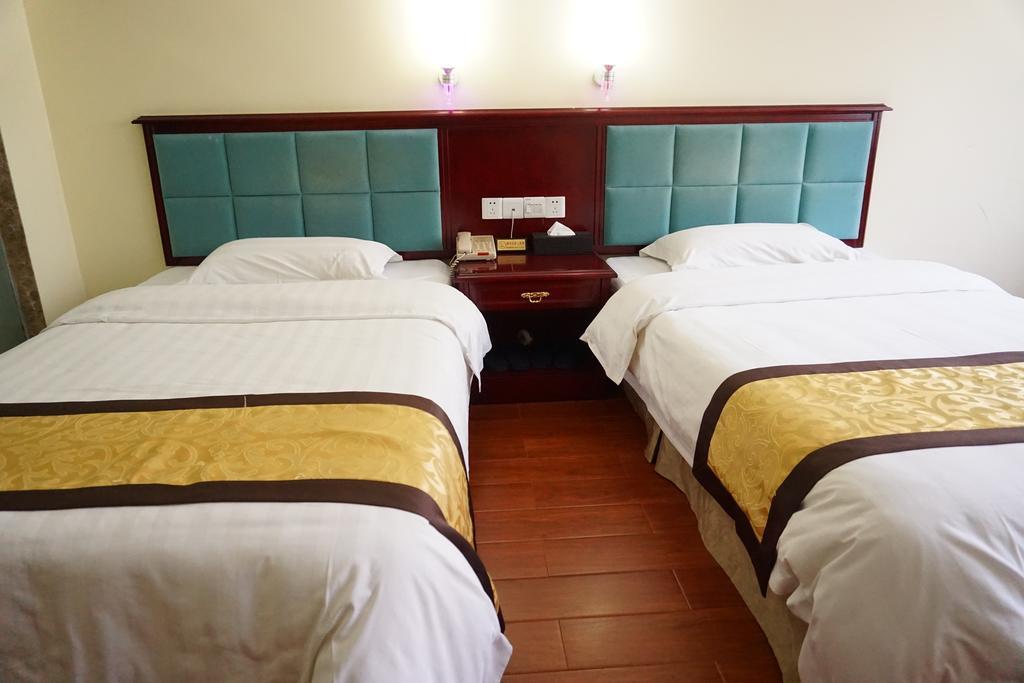 Guangdong Oversea Chinese Hotel Cantón Habitación foto