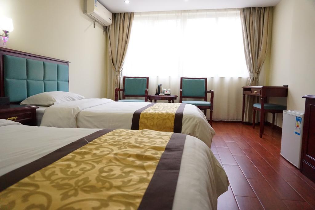 Guangdong Oversea Chinese Hotel Cantón Habitación foto
