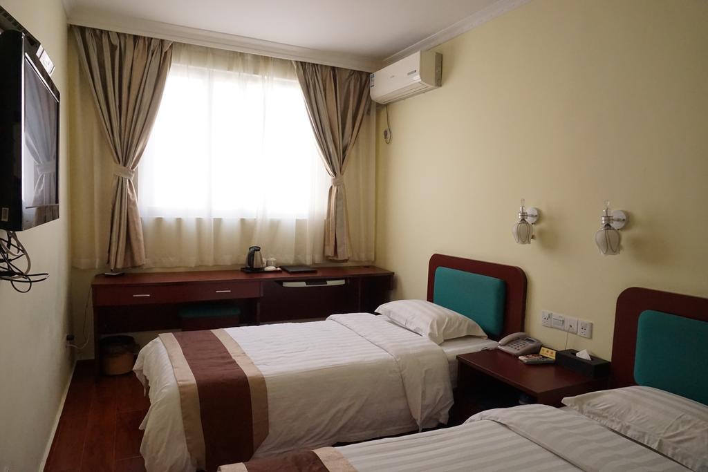 Guangdong Oversea Chinese Hotel Cantón Habitación foto