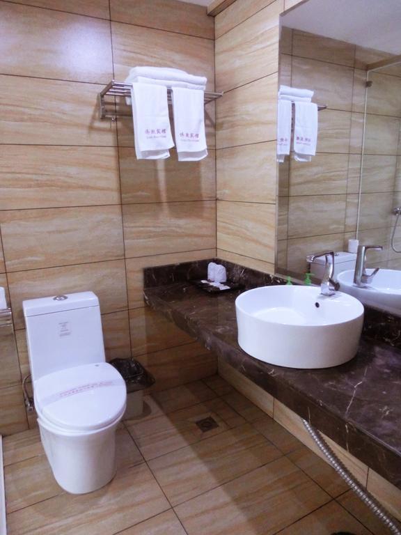 Guangdong Oversea Chinese Hotel Cantón Habitación foto